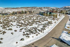 Snowy aerial view with a mountain view