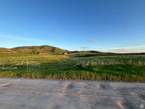 Property view of mountains with a rural view