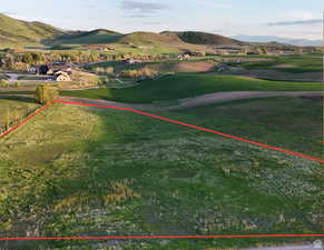 View of home's community with a rural view and a mountain view