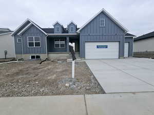 View of front facade with a garage