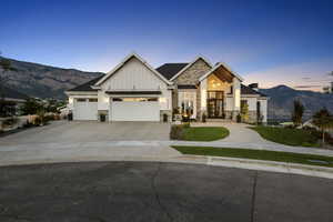 Craftsman house with a mountain view and a garage