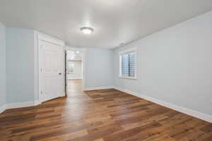 Unfurnished room featuring wood-type flooring