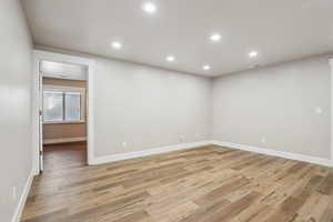 Spare room featuring light hardwood / wood-style floors