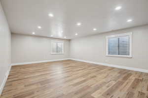 Spare room with light hardwood / wood-style flooring