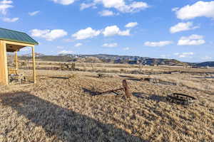 View of mountain feature with a rural view