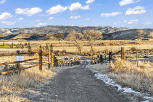 Property view of mountains with a rural view