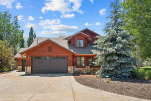 View of front of property with a garage