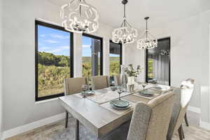 Dining area with a chandelier