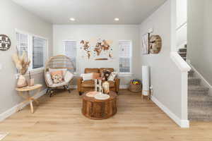 Living area featuring light hardwood / wood-style flooring