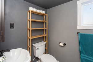 Bathroom with toilet and sink