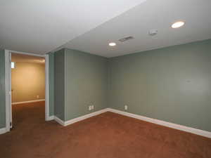 View of carpeted spare room