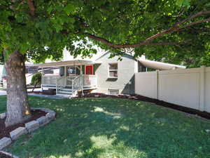 View of front of home featuring a front lawn