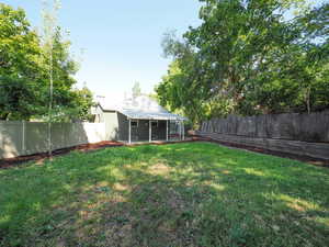 View of yard with a patio area