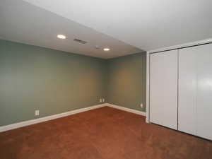 Basement featuring carpet floors