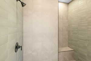 Bathroom with a tile shower