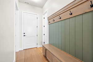 Mudroom featuring light hardwood / wood-style flooring