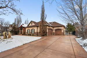 View of front of home featuring a garage