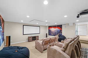 Home theater featuring light colored carpet