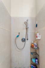 Bathroom with tiled shower