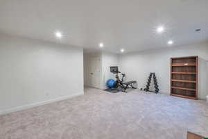 Exercise area with light colored carpet