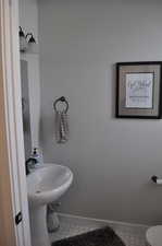 Bathroom featuring tile patterned floors