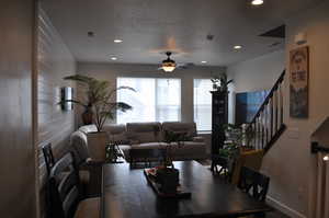 Dining area with a textured ceiling and ceiling fan