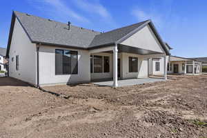 Back of property featuring a patio