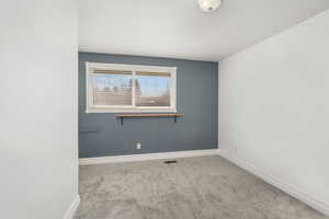 Upstairs bedroom number 3 with new carpet and new paint