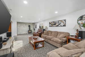 Spacious basement living room with stove