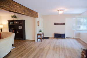 Living area with light hardwood / wood-style floors