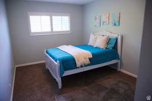 Bedroom featuring carpet floors