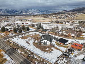 Snowy aerial view with a mountain view