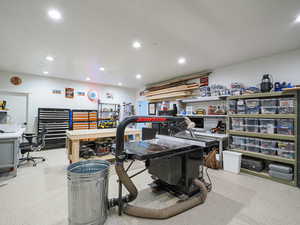 Garage featuring a workshop area