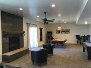 Playroom with billiards, a fireplace, carpet flooring, and recessed lighting