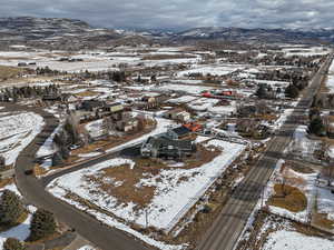 Snowy aerial view with a mountain view