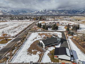 Snowy aerial view with a mountain view