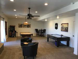 Recreation room with billiards, baseboards, ceiling fan, carpet floors, and recessed lighting