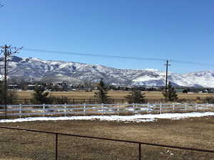 Property view of mountains featuring a rural view