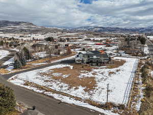 Snowy aerial view with a mountain view