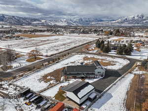 Snowy aerial view with a mountain view