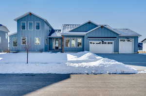 View of front of house with a garage