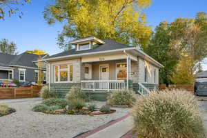 Bungalow featuring a porch