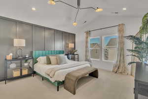 Bedroom featuring light carpet and lofted ceiling