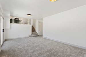 View of carpeted spare room