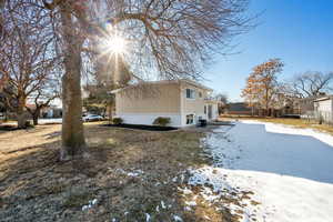 View of snow covered property