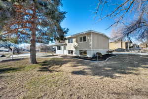 Exterior space featuring a yard