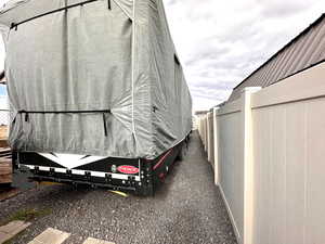 Extra long RV Parking behind vinyl gate