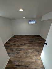 Bedroom 3 with dark wood-style flooring