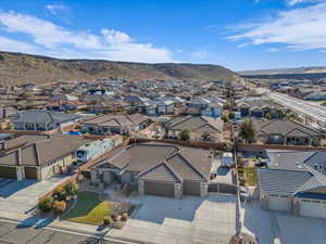 Birds eye view of property with a mountain view