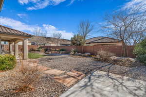 View of yard with a patio